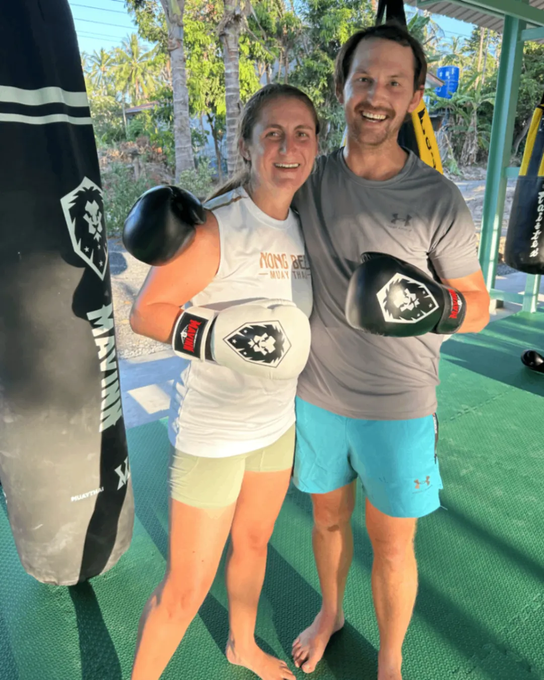 Couple posing with gloves